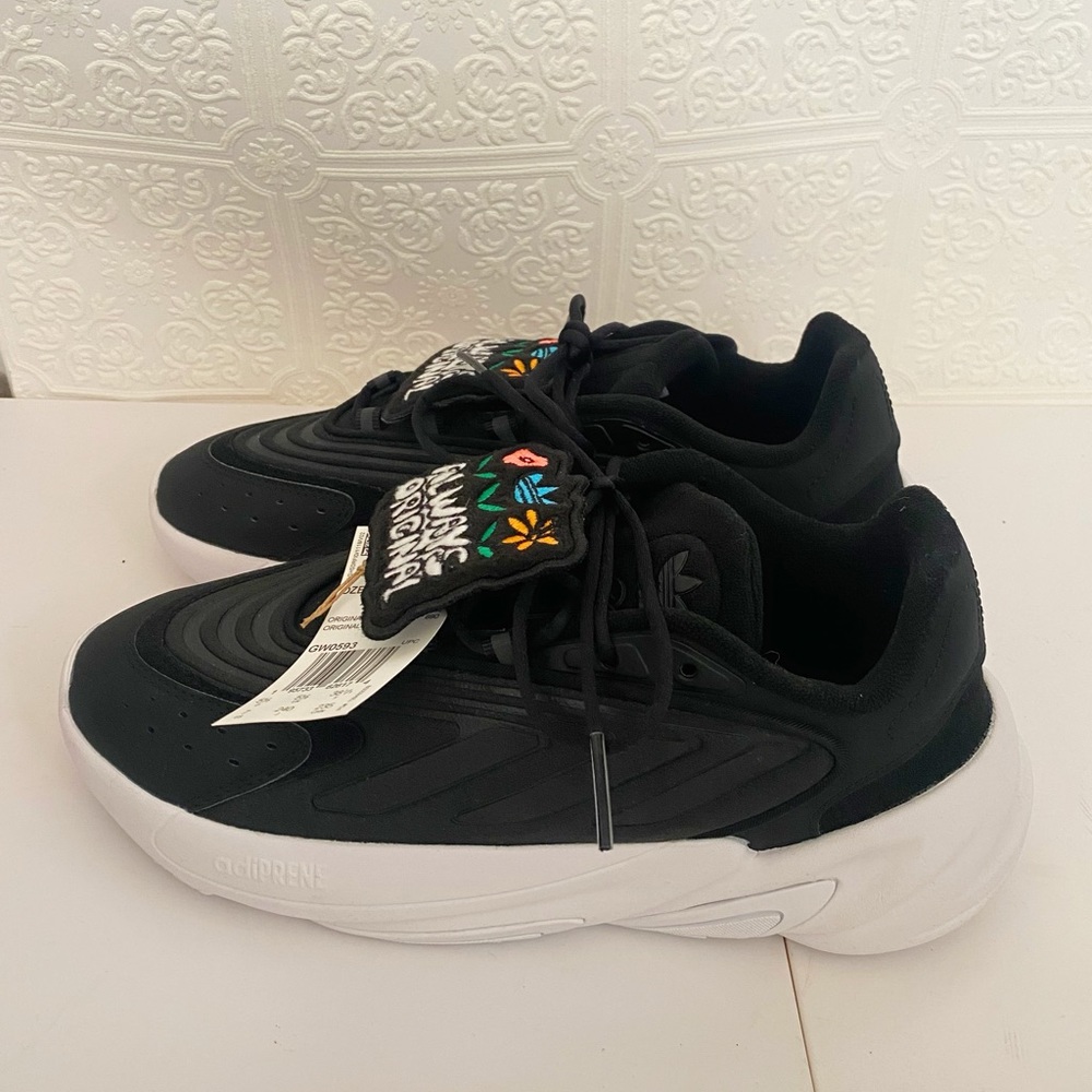 Adidas Ozelia with cute patch